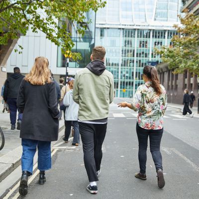 students walking on silk street